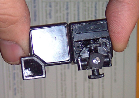 Inner mechanism next to a standard cube corner
