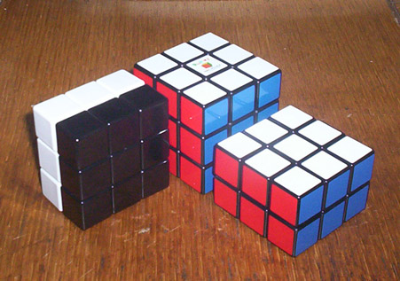 2x3x3 cuboid next to standard Rubik's Cube